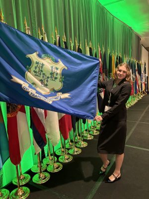 Rylee holding CT flag