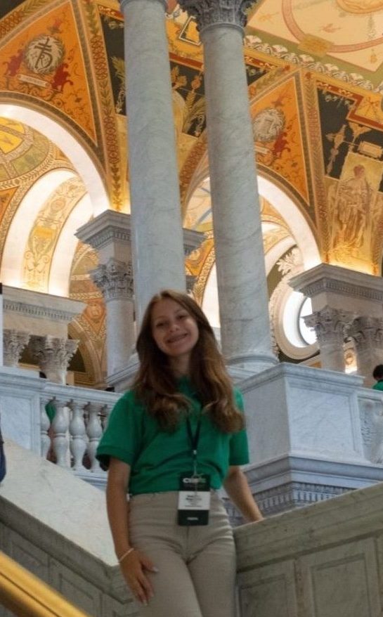 Zuzanna standing on the stairs in the state capitol