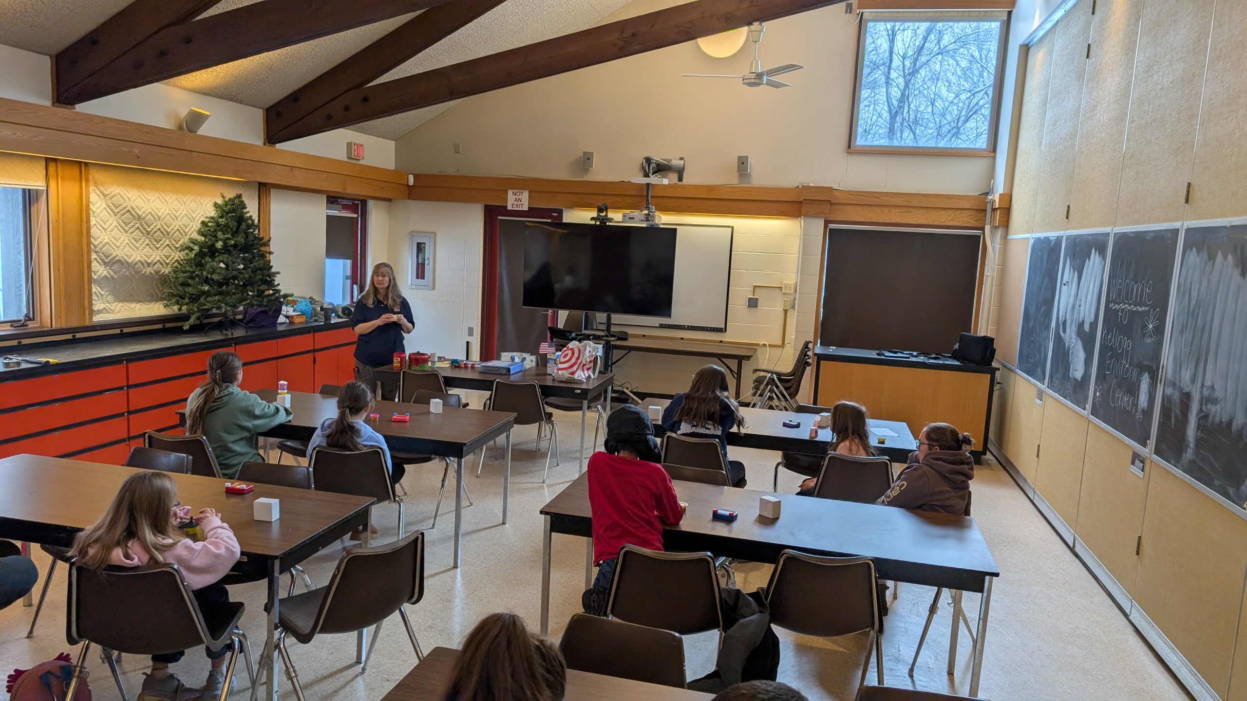 Classroom with youth listening to speaker